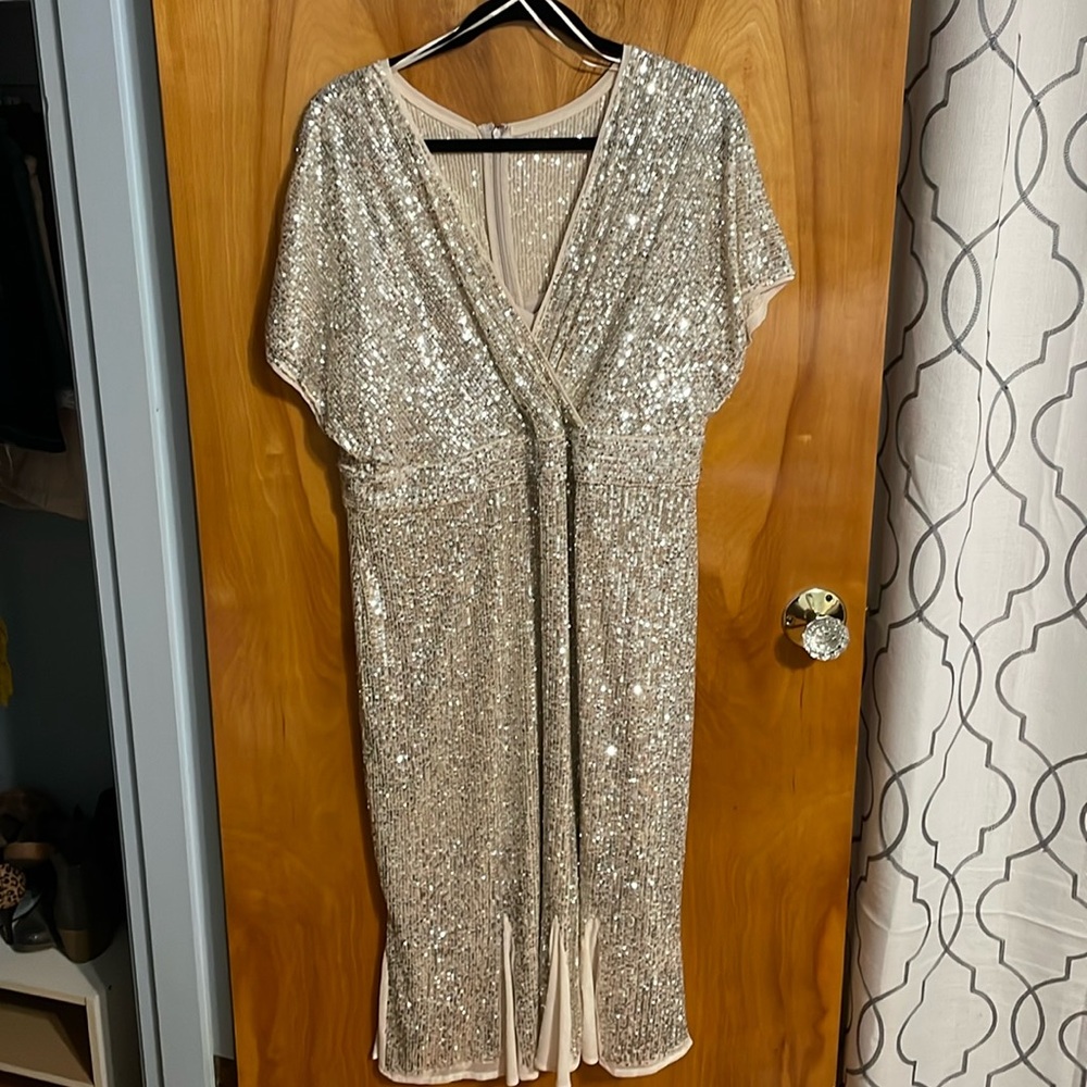 Mid shin length golden sequin dress. Worn once. Purchased at Dillard. Size 14